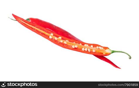 Two intersecting halves of red chili peppers isolated on white background