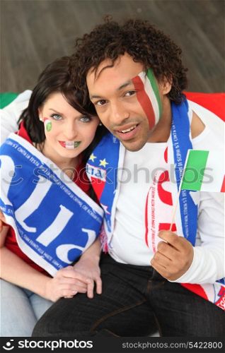 Two Italy supporters sat at home
