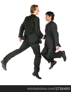 Two jumping businessmen