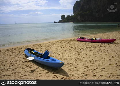 Two kayaks on the beach, Phi Phi Islands, Thailand