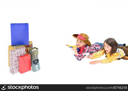 two kids shooting to some shopping bags