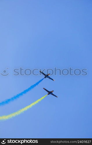 Two L-29 jet planes draw the flag of Ukraine. Kharkov. AviaFest 2021