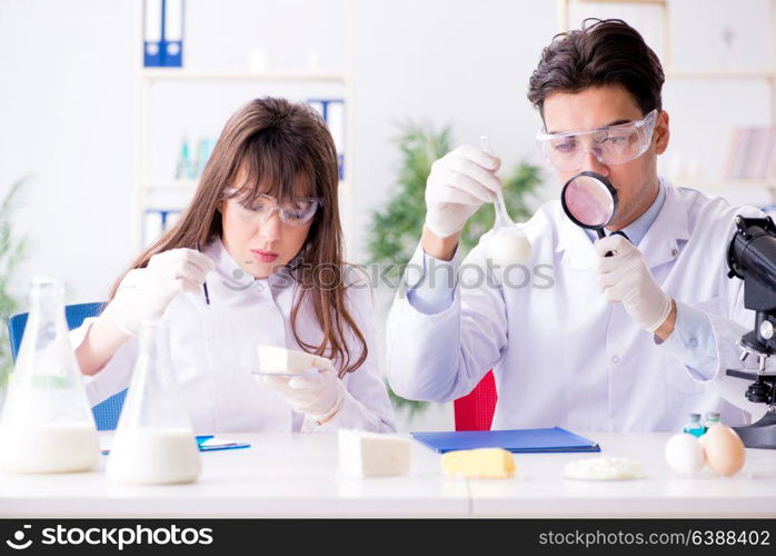 Two lab doctor testing food products