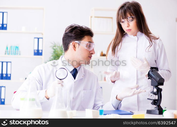 Two lab doctor testing food products