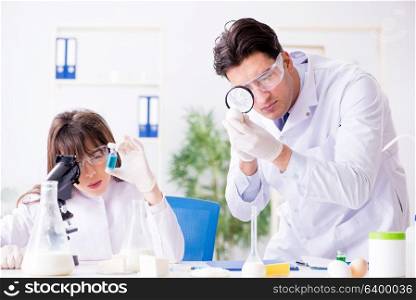 Two lab doctor testing food products