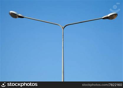 Two lamp poles. The blue background behind all of the stomach.