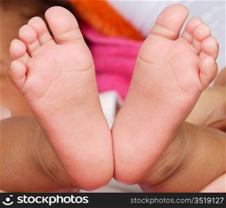 Two little baby feet
