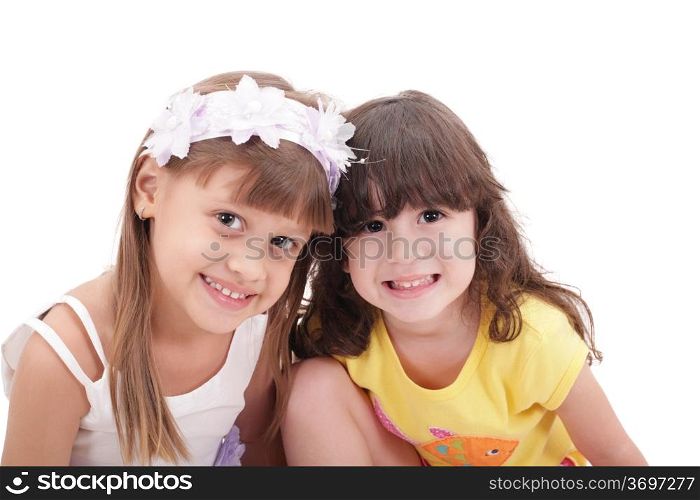 Two little girls, isolated over white