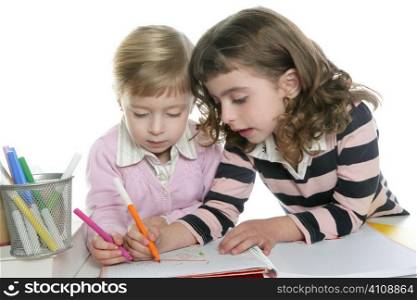 two little sister student doing homework together on table desk teamwork