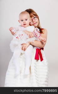 Two little sisters portrait.. Sisterly love. Two lovely cute little girls. Happy positive childhood of two sisters loving each other. Good emotion.