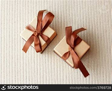 Two luxury gift boxes with ribbon and bow