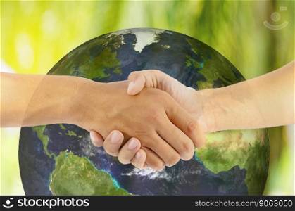 two man hand shaking with earth background, Elements of this image furnished by NASA