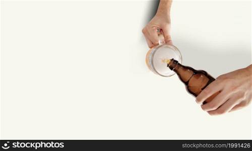 Two Man Hands With Beer Mug and bottle On White Background