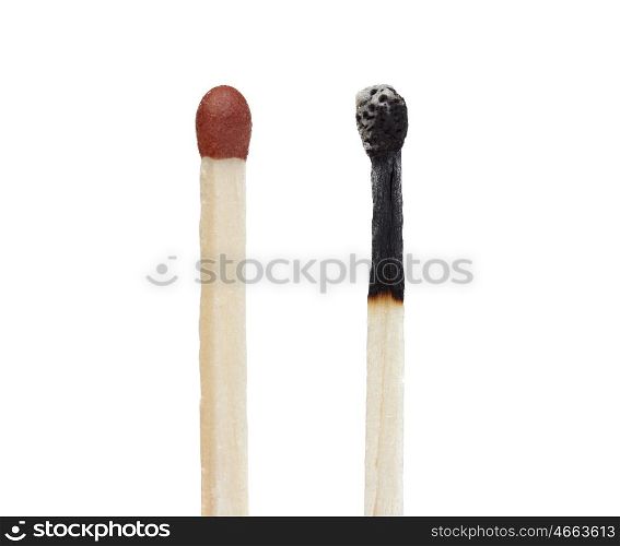 Two matches a burned and other unburned isolated on a white background