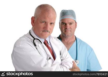 Two medical doctors, serious and concerned. Isolated on white.