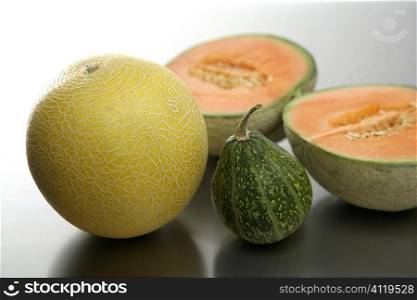 two Melon fruits and pumpkin