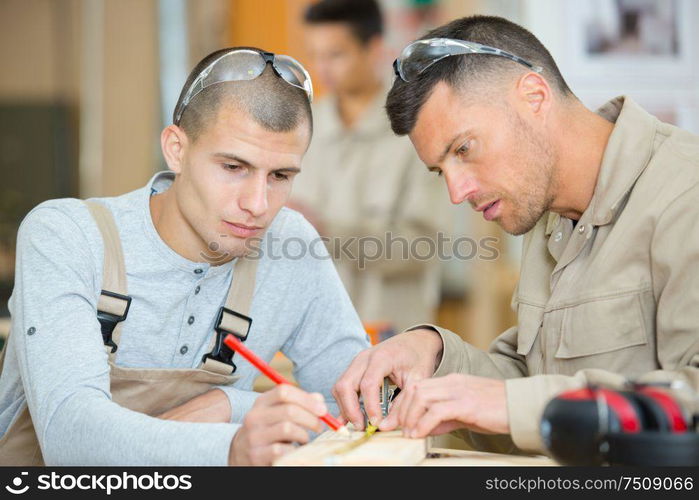 two men are at workshop