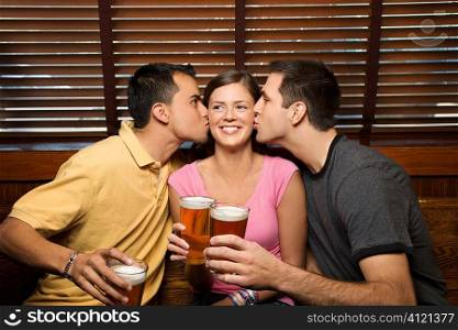 Two Men Kissing Young Woman