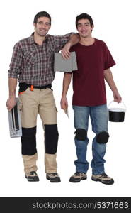 Two men preparing to tile bathroom