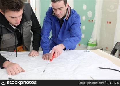 Two men starting DIY project