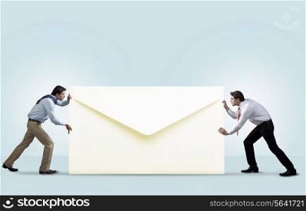 Two men with an envelope