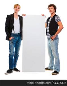 Two modern teenagers holding blank billboard. Isolated on white&#xA;