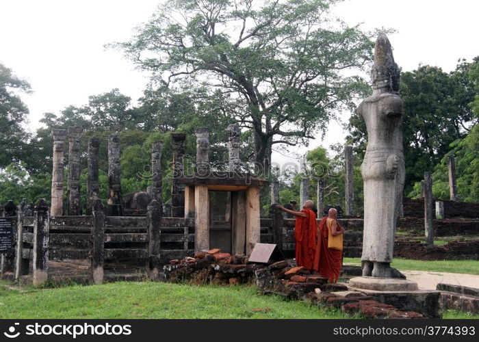 Two monks near Latha-Mandapaya temple in Polonnaruwa, Sri Lanka