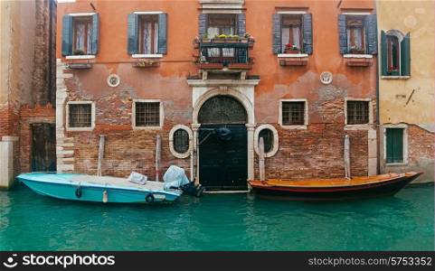 Two motor boats near entrance of the house on Venice channel&#xA;