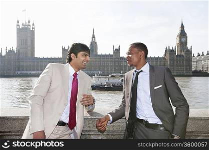 Two multi ethnic businessmen having a conversation
