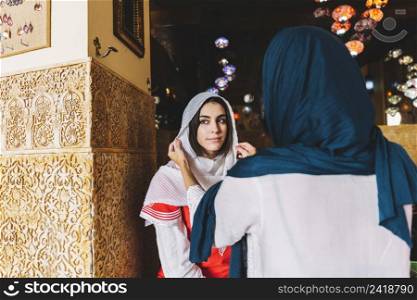 two muslim women street