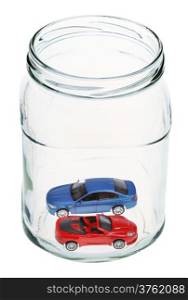 two new cars in open glass jar