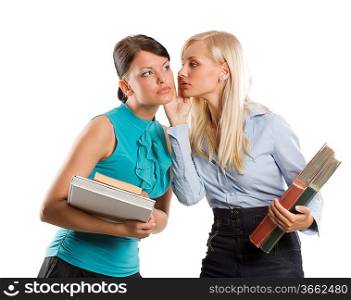two nice girl blond and brunette with book like student one wishpering to the other