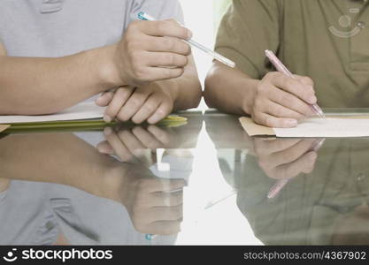 Two office workers discussing in a meeting