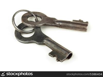 Two old keys in key ring isolated on white