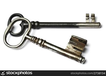Two old keys isolated on white background