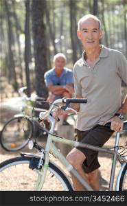 Two older men out for a bike ride