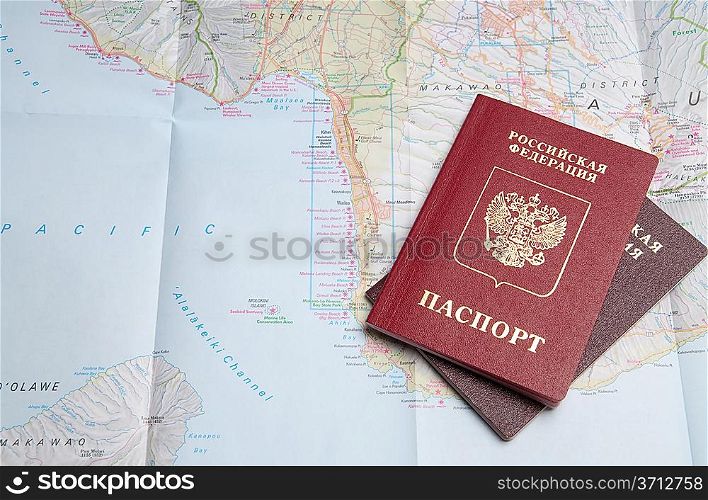 Two passports on a map