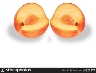 Two peach cut on slices on a white background