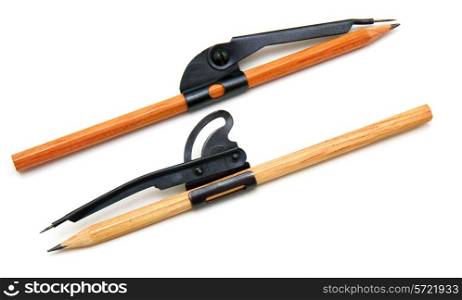 Two pencils and compasses on a white background