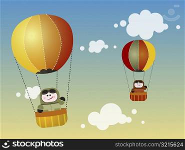 Two people in hot air balloons