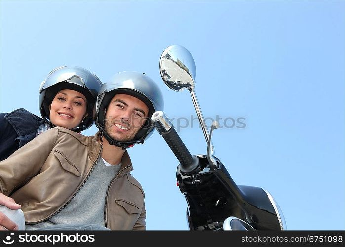 two people on scooter