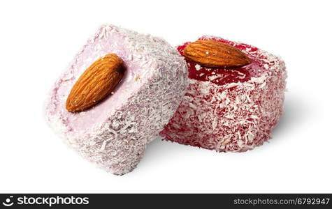 Two pieces of Turkish Delight with almonds isolated on white background