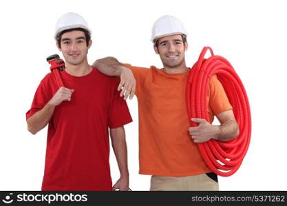 Two plumbers about to start work