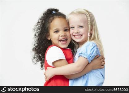 Two Pre School Girls Hugging One Another