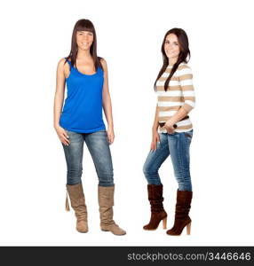 Two pretty girls with jeans isolated on a over white background