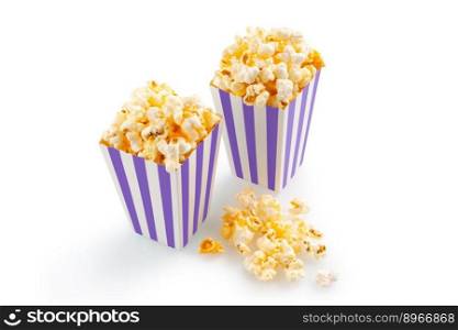 Two purple white striped carton buckets with tasty cheese popcorn, isolated on white background. Movies, cinema and entertainment concept.
