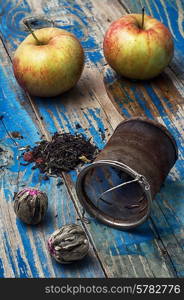 two red apple,strainer infuser tea of different varieties