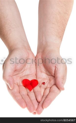 two red hearts on male palms isolated on white background