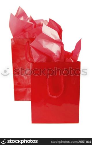 Two red shopping bags isolated on white background