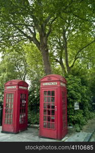 Two red telephone boxes on Primrose Hill, London